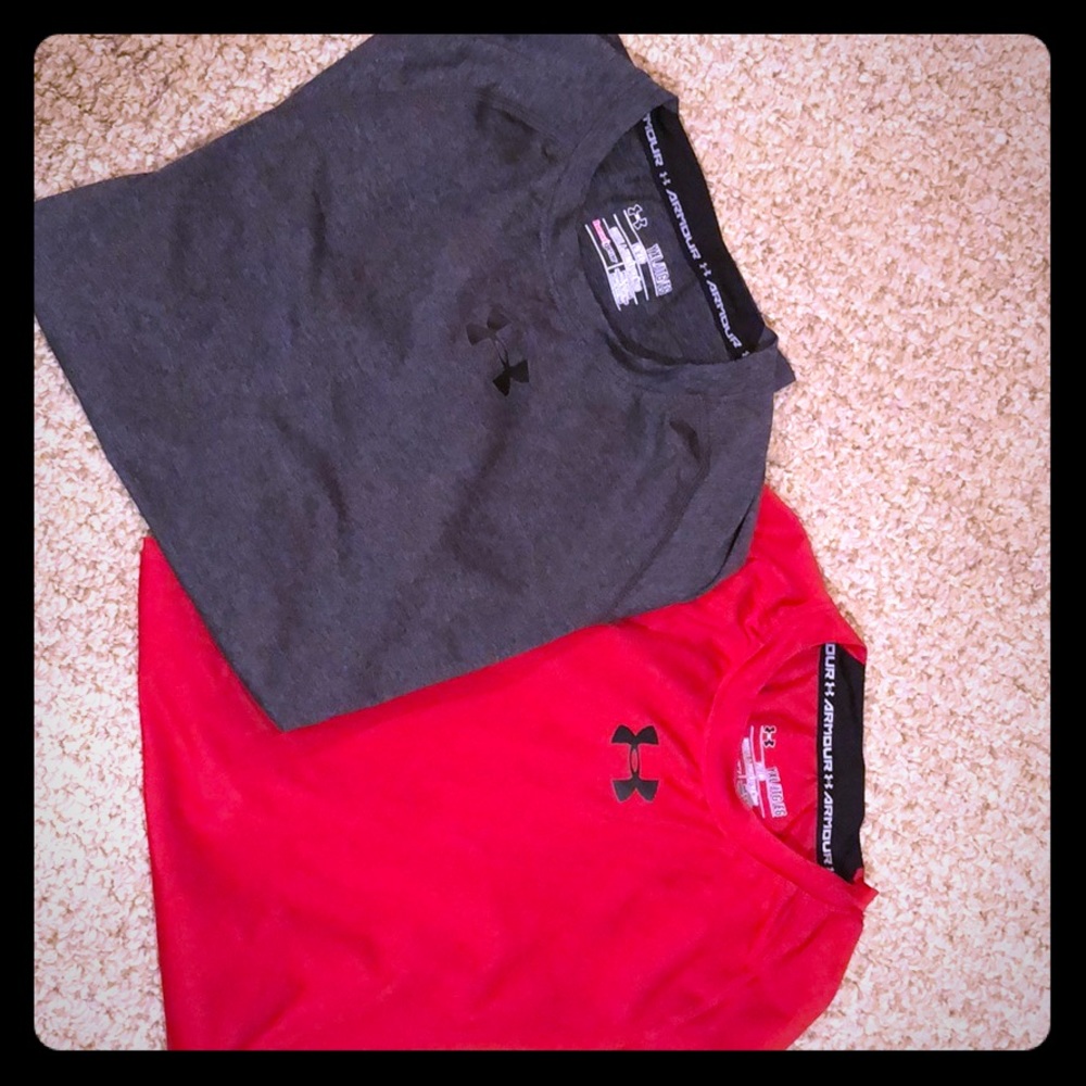 Two Under Armour fitted hear gear short sleeve